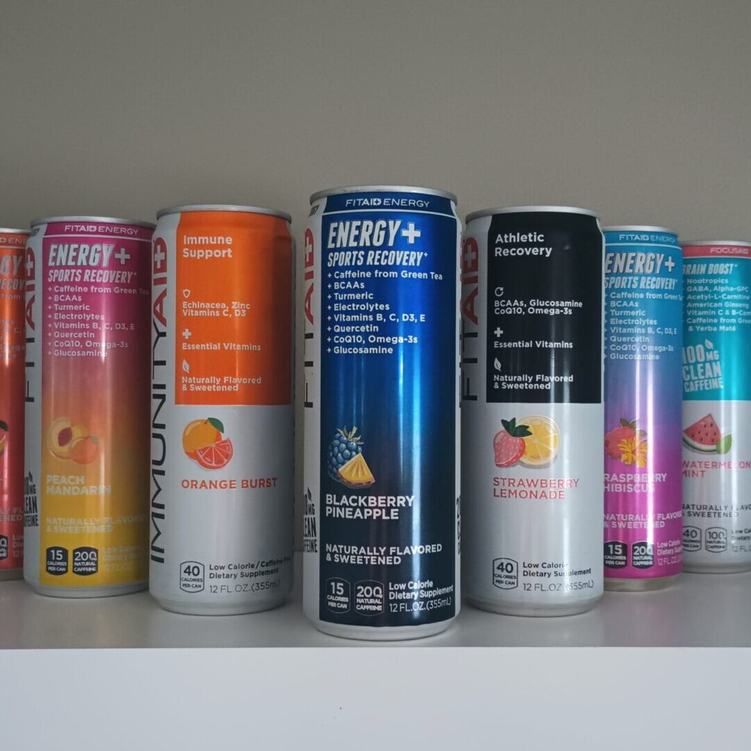 A shelf with many different cans of energy drinks.